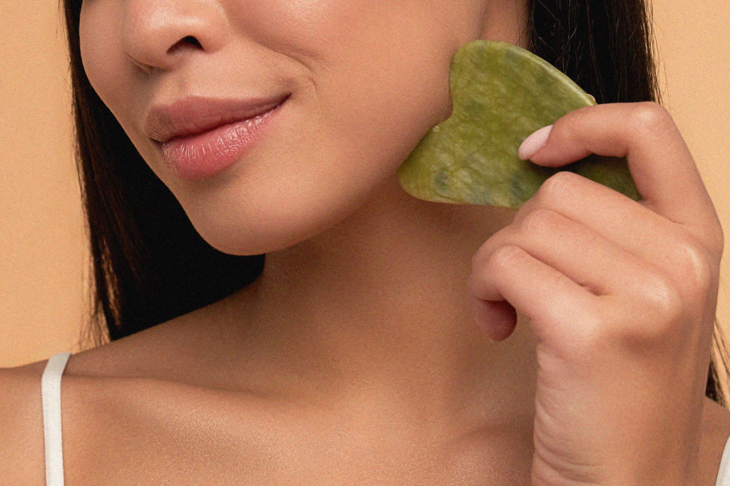 Lymphatic massage techniques or Gua Sha